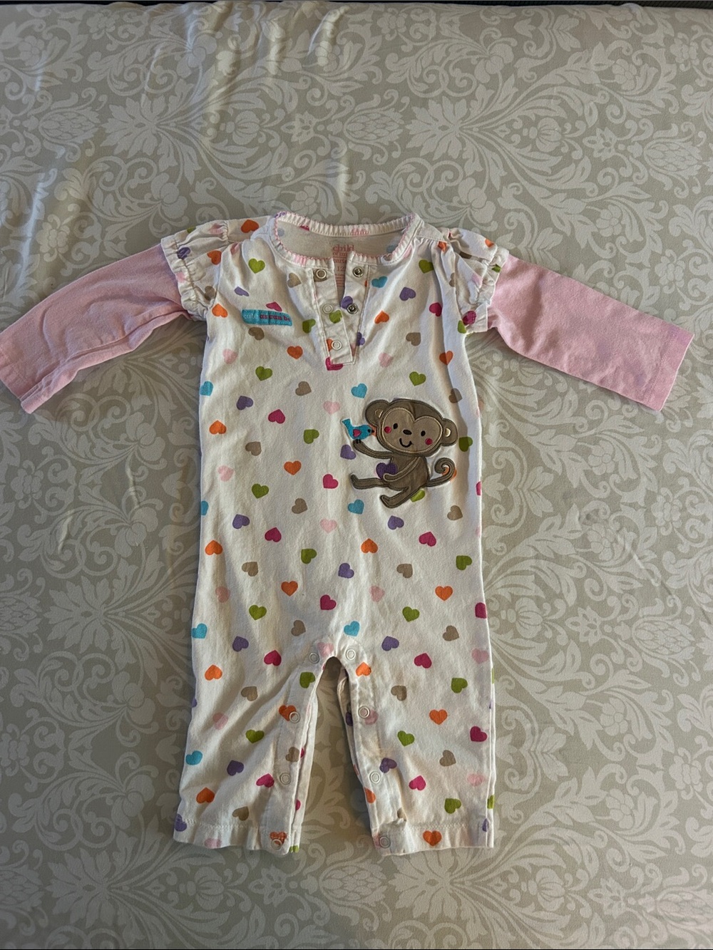Carter's White One-Piece Footie with Pink Sleeves and Multicolor Hearts